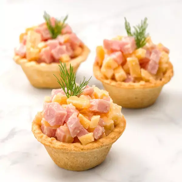 Тарталетки с ветчиной и сыром